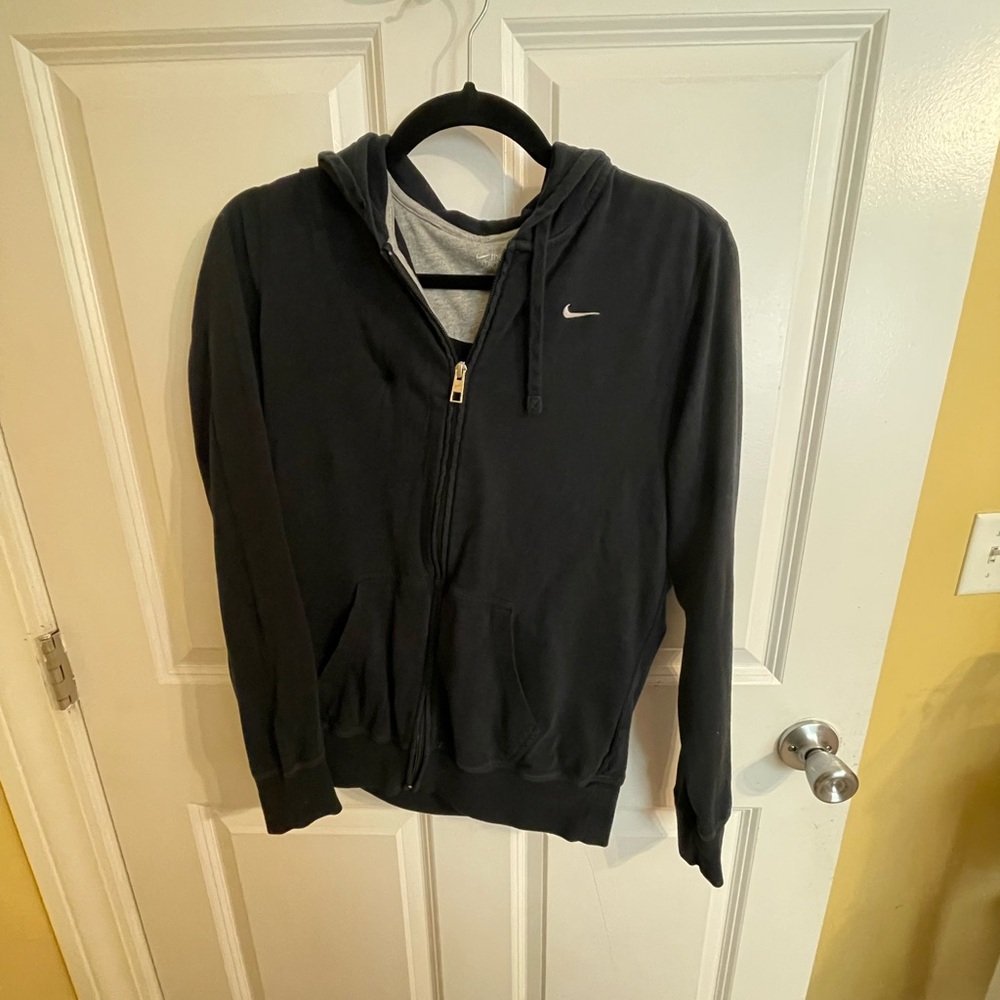 Black fitted Nike jacket. Size XL